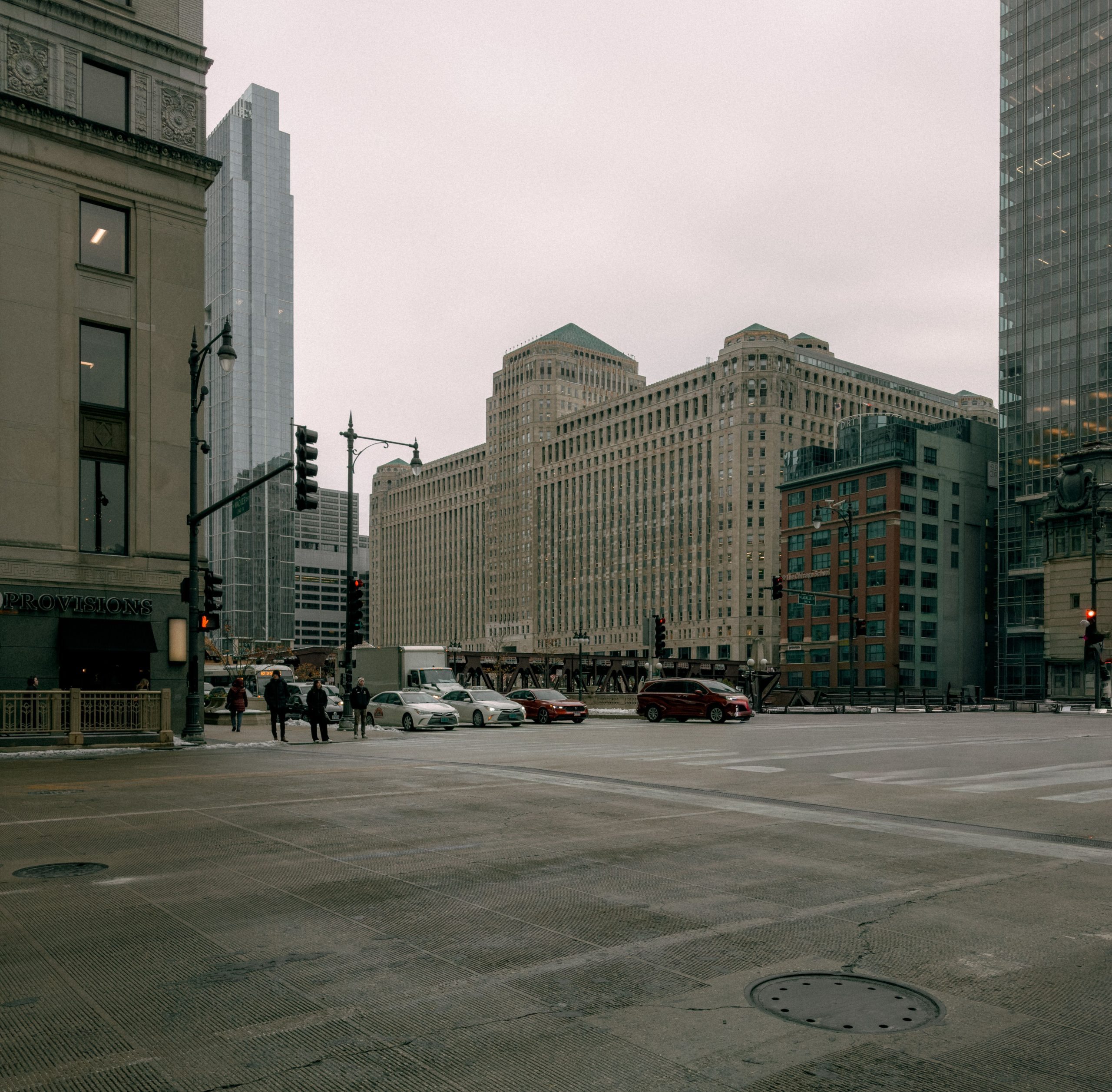 Busy Chicago intersection with cars, illustrating urban crash-risk locations.